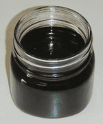 Filtered varnish in mason jar