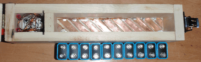 Battery box, empty, with copper contacts visible