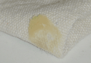 Paste wax on cloth