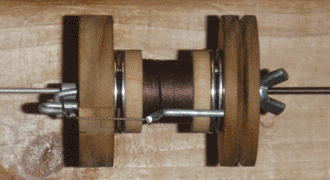 Yarn spinner with both insulation layers visible